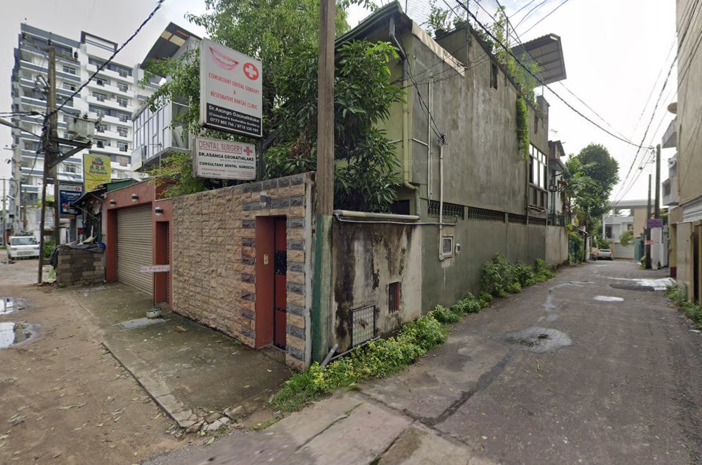 Street view of the clinic entrance and Dental Surgery sign